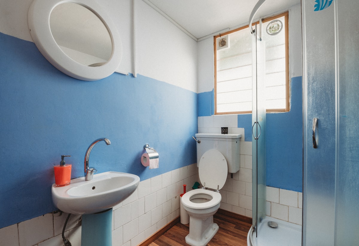 Dated bathroom with old fittings before renovation