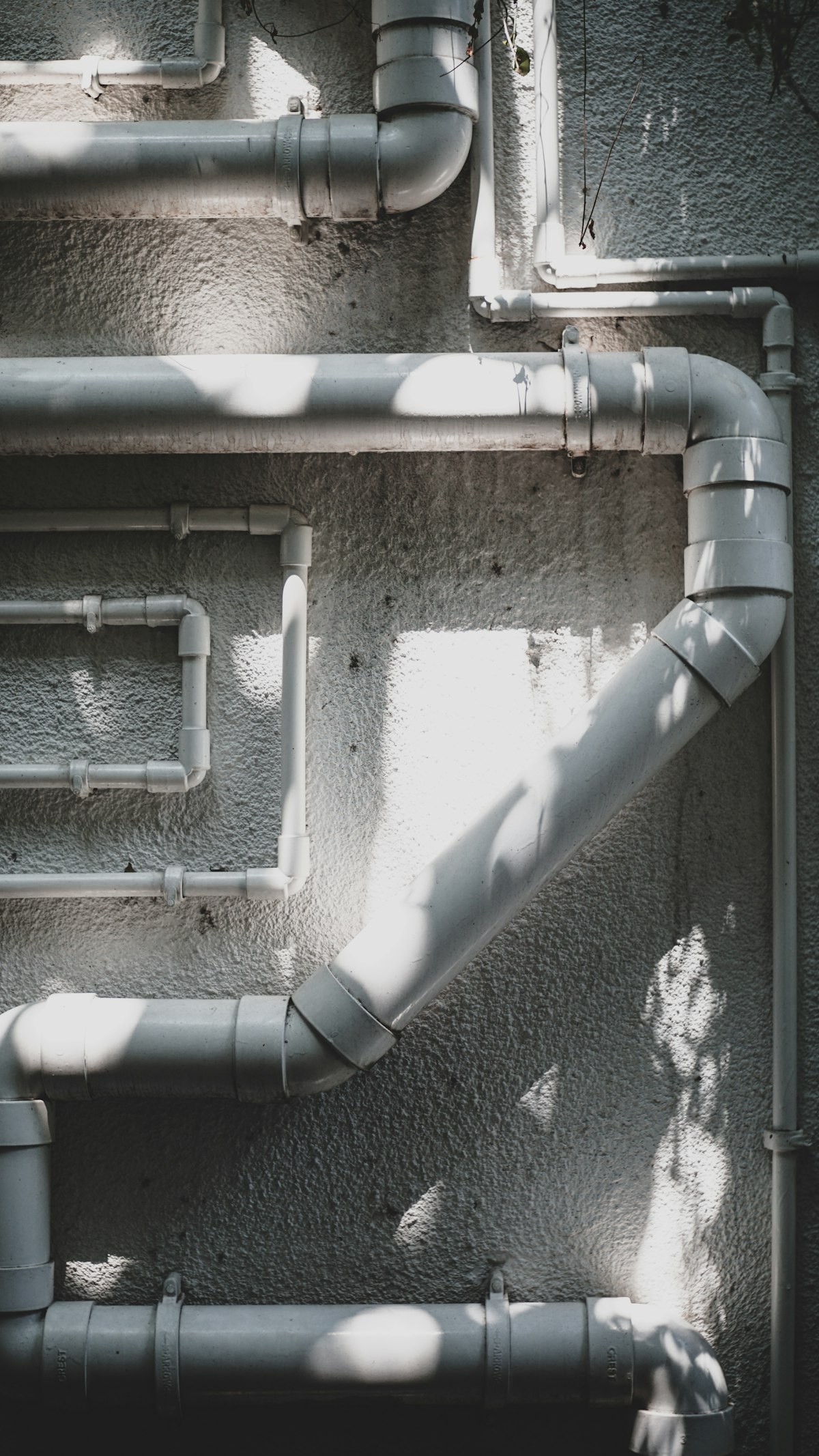 New PVC waste lines neatly installed and clipped
